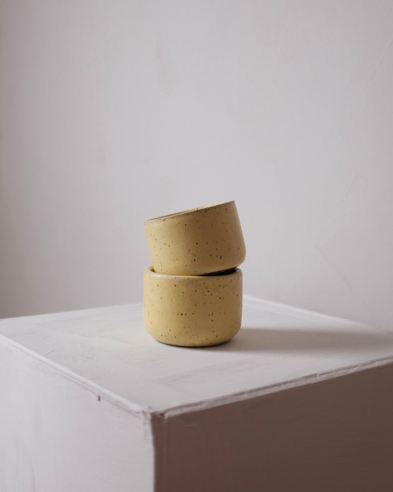 Cup — speckled yellow